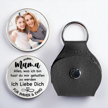 Mutter und Tochter-Taschenumarmung mit Foto